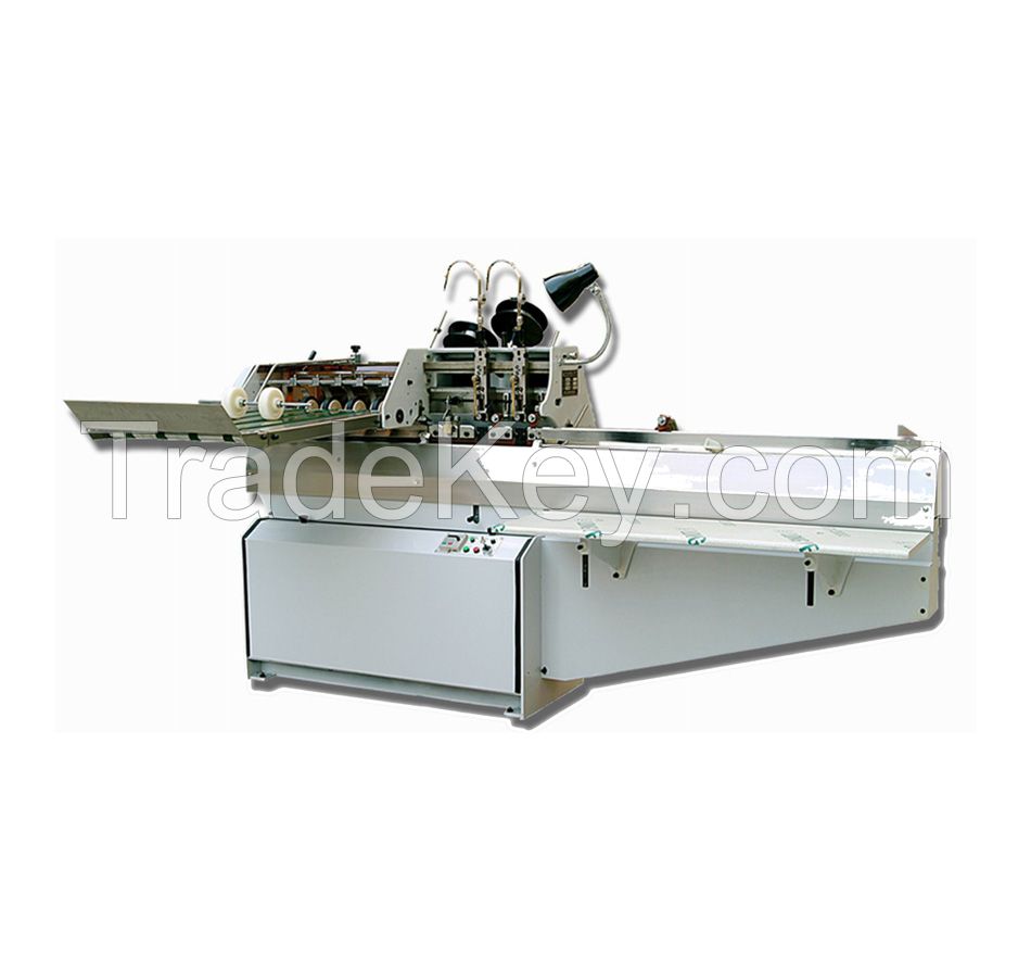 Saddle stitching machine