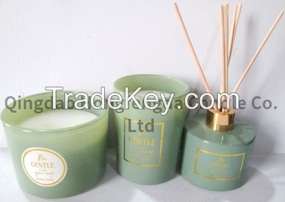 wax filled glass with scent and reed diffuser