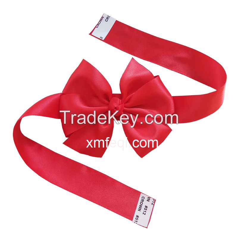 Factory made satin ribbon bow on band with self stickers around box
