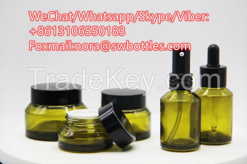Wholesale inclined shoulder pickles green glass cosmetic bottles cream packaging glass bottles