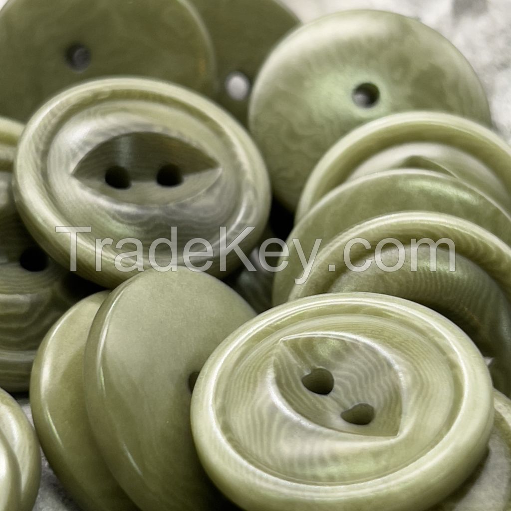 High quality fish eye natural corozo buttons all size available in mutiple colors