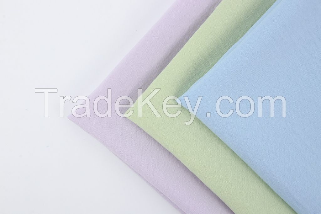 Polyester Plain weave woven dyed CEY light weight clothing fabric for summer garment skirt shirt apparel