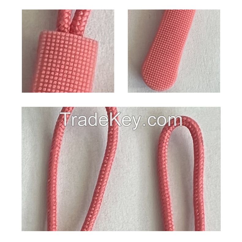 Injection molded zipper tail