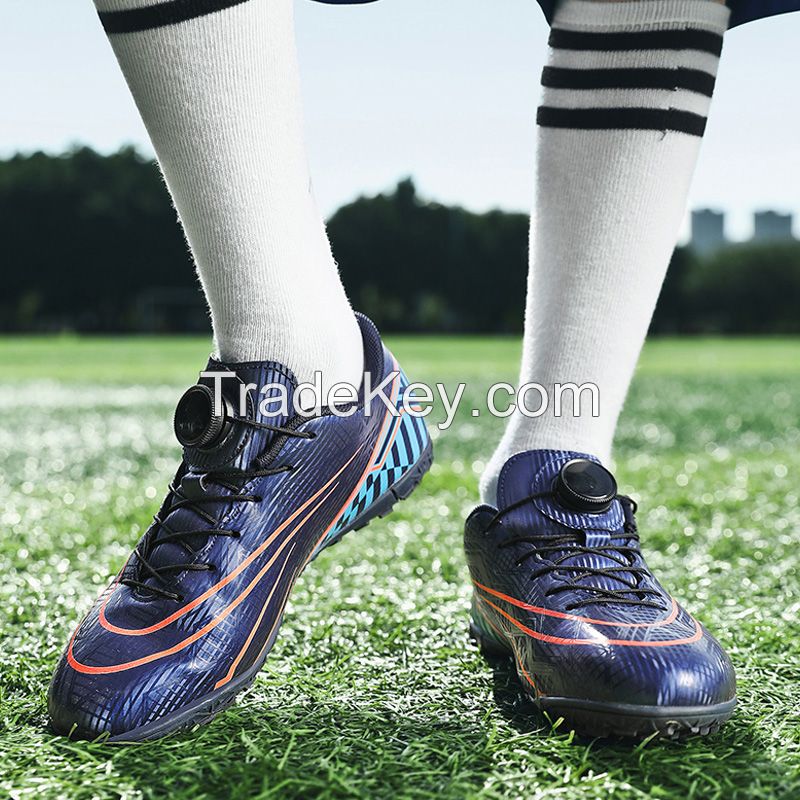Rotating deduction football shoes dark blue/blue/pink