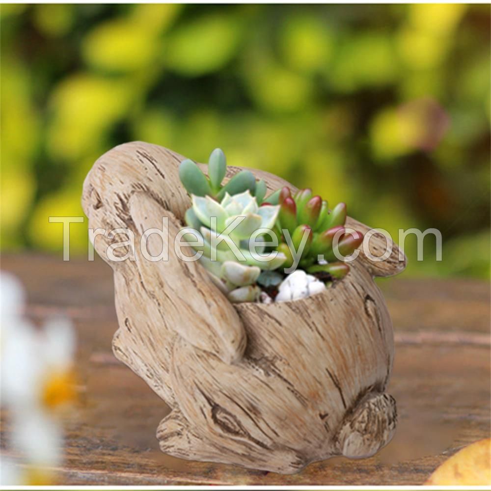 Polyresin bird/snail/rabbit planter