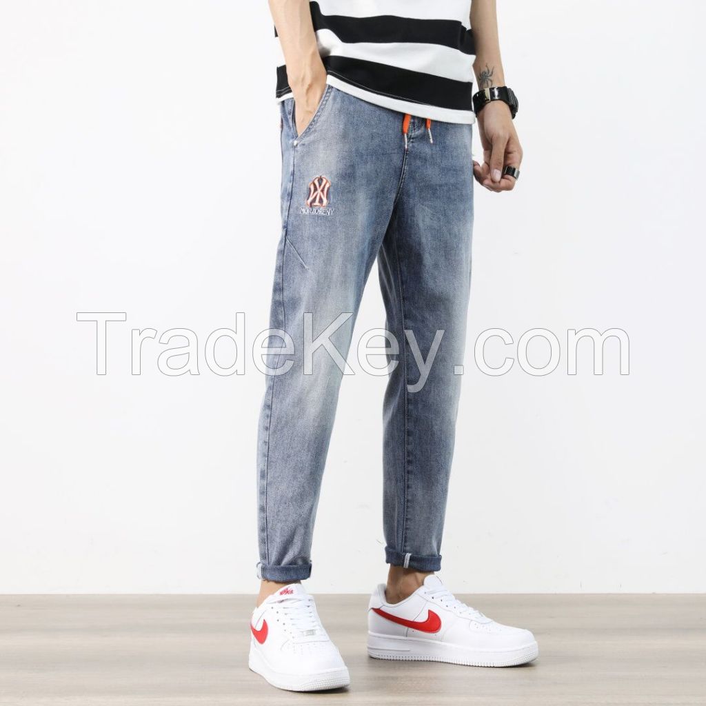 Wholesale OEM 100% Cotton Mens Loose Fit Denim Pants Fashion Laser Print Jeans