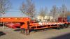 ChinaTrailers 3 Axle 40ft Flatbed Container High Bed Semi Trailer For Sale