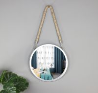 The raw-iron metal frame provides unique industrial shelving Decorative Mirror