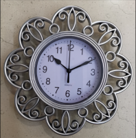 Decorative Hollowed-out Plastic Quartz Wall Clock