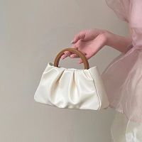 2022 Niche New Female Wrapped Wooden Handle Pleated Cloud Small Tote Single Shoulder Slant Mini Bag