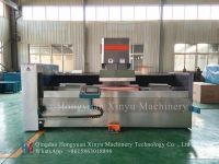 Double head grinding machine for rotogravure cylinder